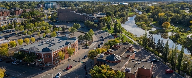 An aerial view of Downtown St. Albert with St. Albert Place and the Sturgeon River